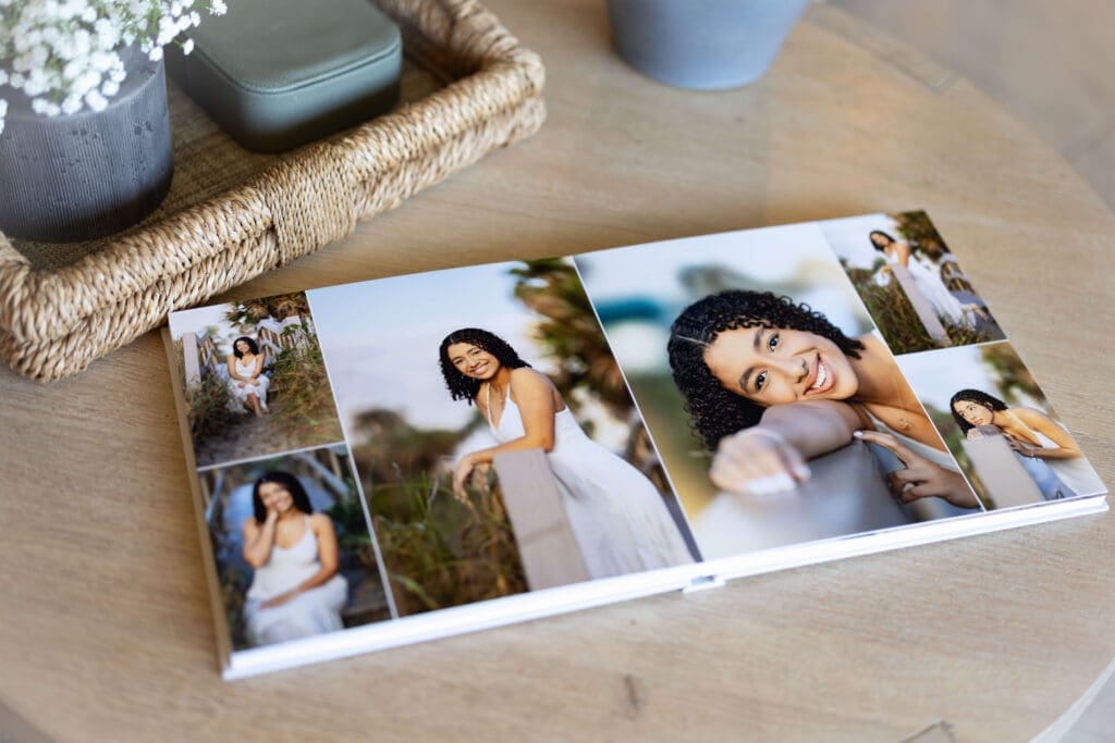 Heirloom linen album for a luxury senior photo session with Petal and Stone Photography in Winter Garden Florida showing the printed artwork included in her collection.